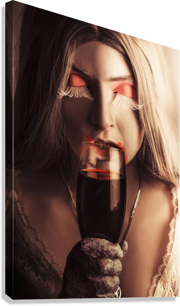 Vampire girl with holding glass of blood Canvas Print