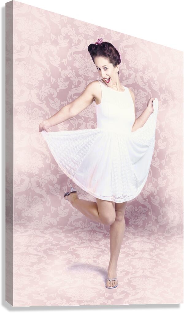 Young beautiful pinup woman dancing in retro dress Canvas Print
