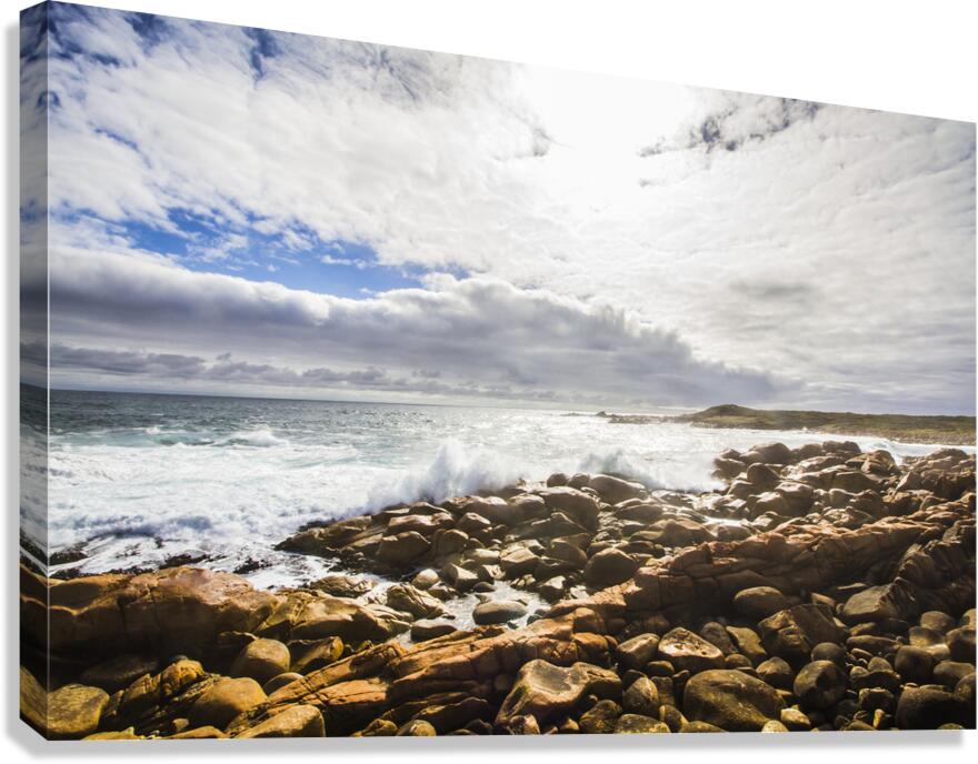Sun rising over the ocean Canvas Print