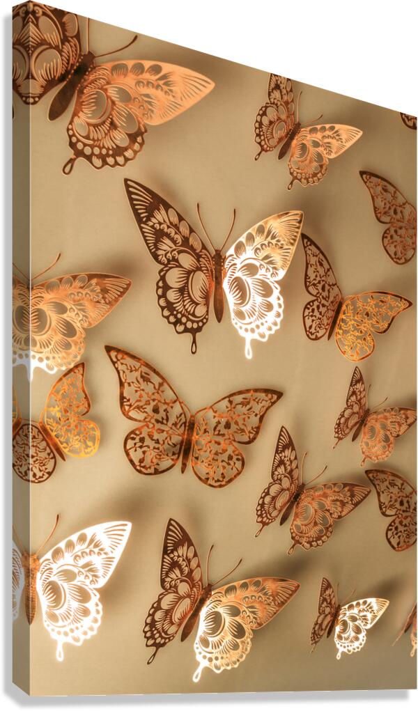 Golden butterflies adorning a soft beige wall Canvas Print