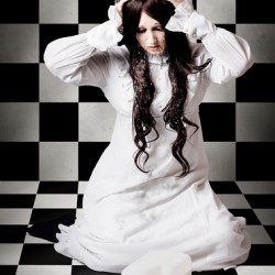 Retro girl crying over a glass of spilt milk