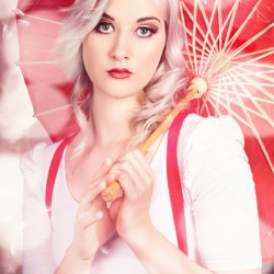 Sexy blonde vintage pinup girl. Field of dreams