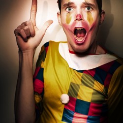 Clown Bank Robber Performing A Copyspace Holdup