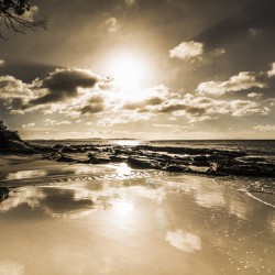 Sun sand and sea reflection
