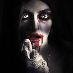 Scary vampire woman. Bloody halloween horror