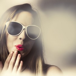 Surprised pinup girl in retro fashion makeup