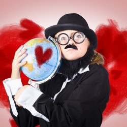 Eccentric man showing world love by cuddling globe