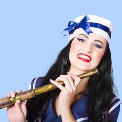 Pinup sailor girl holding telescope