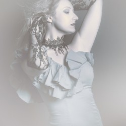 Mystery woman in blue dress and black choker