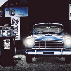 60s Australian FC Holden parked at old garage