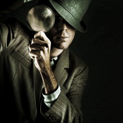 Security Detective With Magnifying Glass