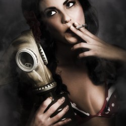 Vintage army pinup girl holding gas mask