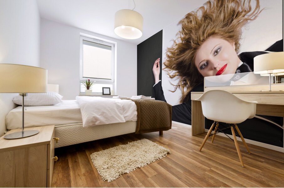 Beautiful blond girl with healthy long hair Mural print