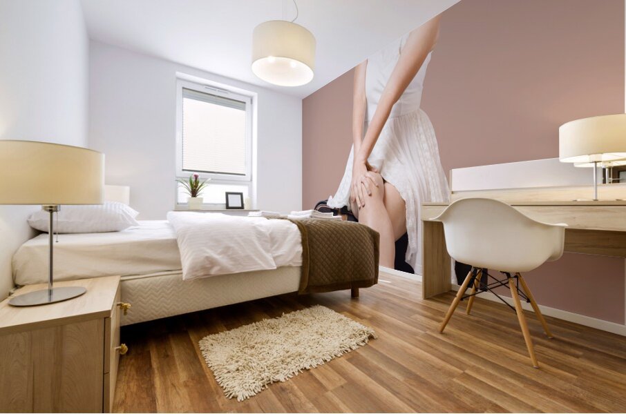 Female pinup travelling tourist sitting on luggage Mural print