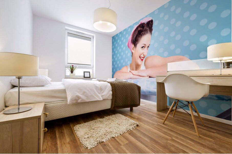 Happy 60s pinup housewife on blue ironing board Mural print