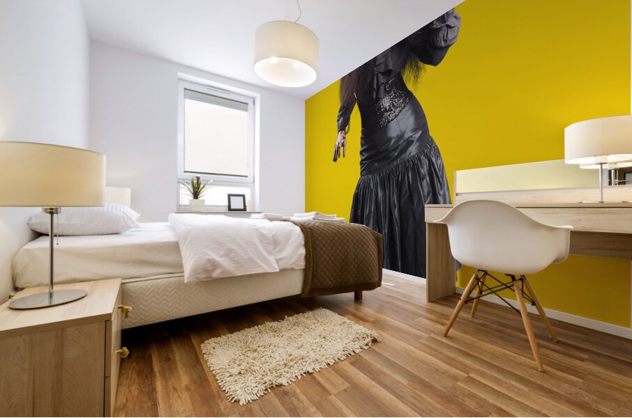 Female jester holding lit fire torch Mural print