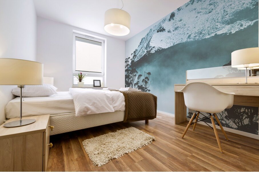 Dramatic dark blue mountain with snow and fog Mural print