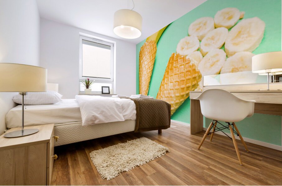 Whole bannana and slices placed in ice cream cone Mural print
