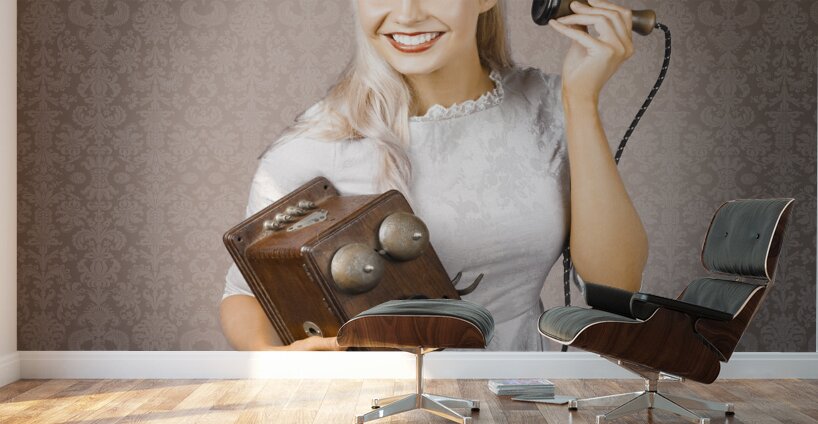 Smiling Vintage Woman Hearing Good News On Phone Wall Murals