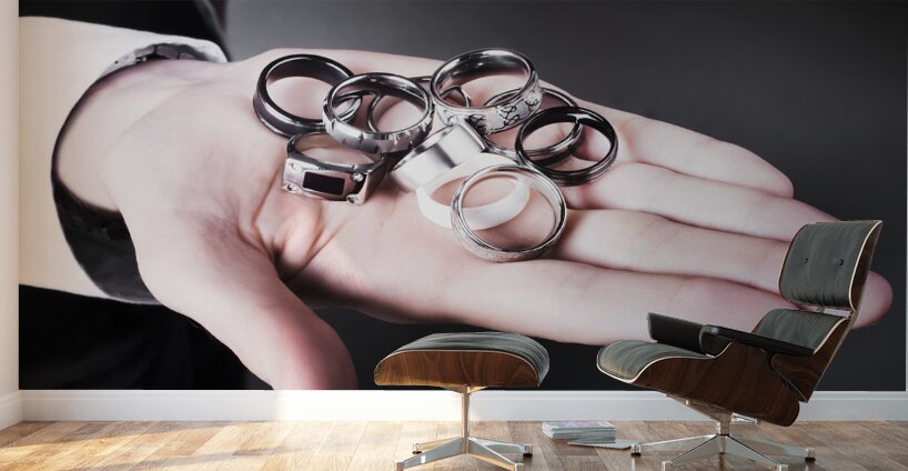 Man displaying a selection of stylish rings Wall Murals