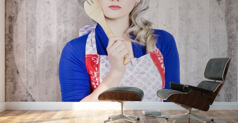 Young pinup housewife thinking what to cook Wall Murals
