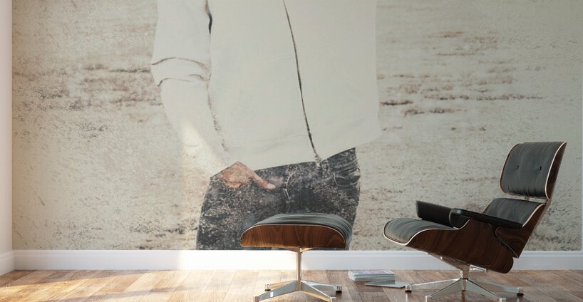 Vintage snowboarding man carrying board in snow Wall Murals