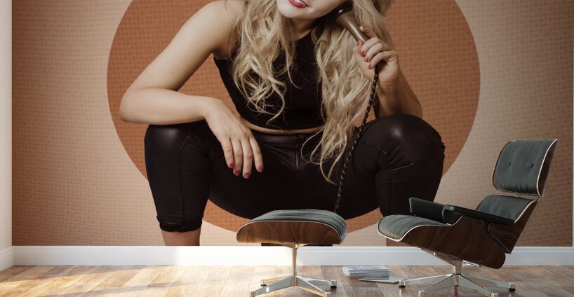 Happy pin up girl talking on retro box telephone Wall Murals