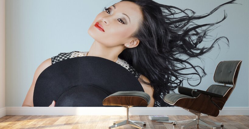 Woman posing with hat Wall Murals