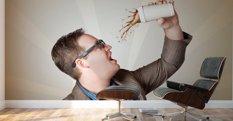 Business man drinking a quick coffee on the go Wall Murals