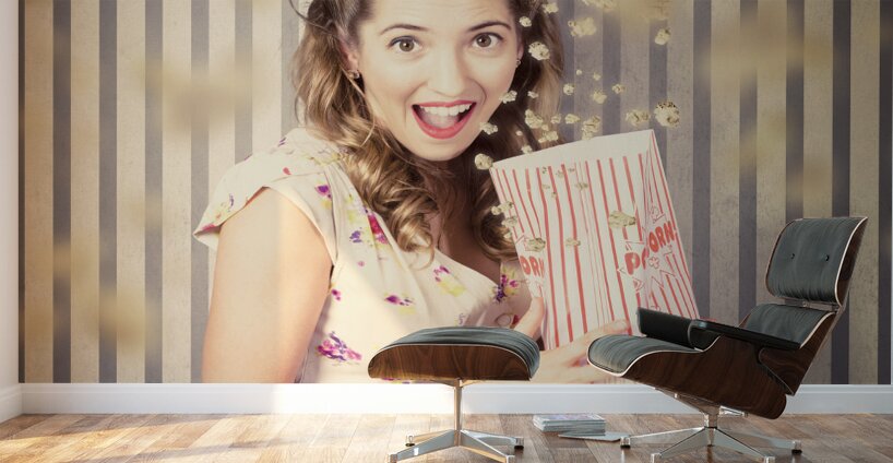 Young girl at the cinema watching halloween movie Wall Murals