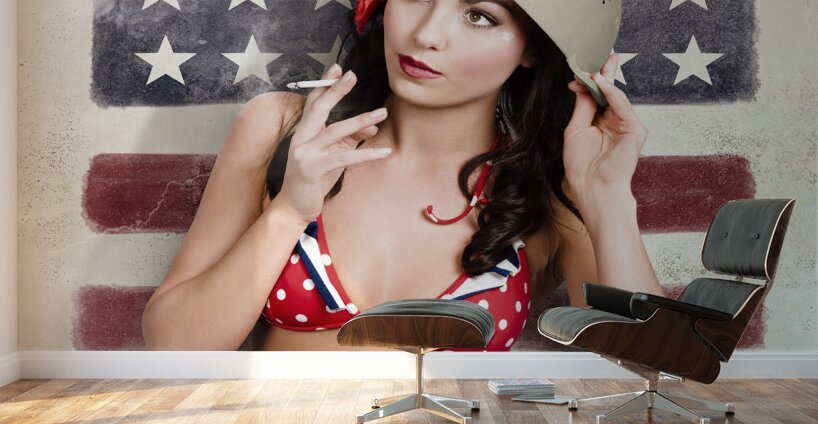 USA pin-up woman. On vintage American flag wall Wall Murals