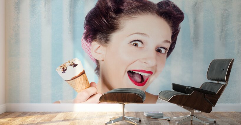 Cool pin-up woman in cold freezer with ice-cream Wall Murals