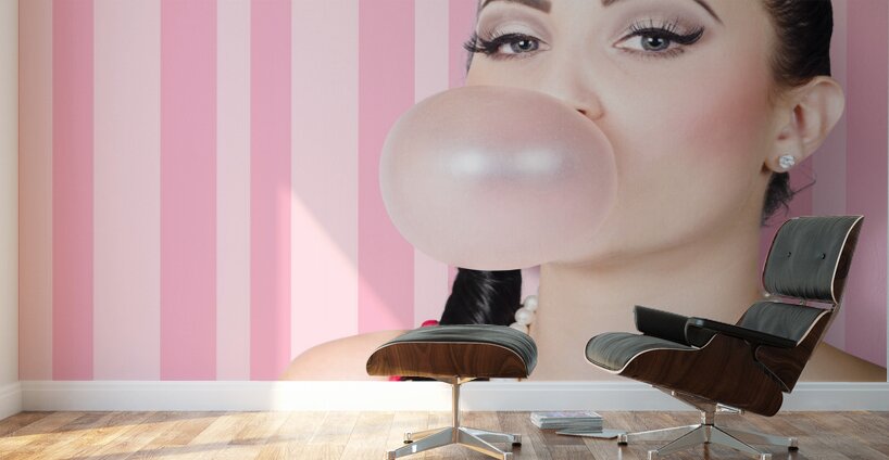 Cute candy store girl blowing chewing gum bubble Wall Murals