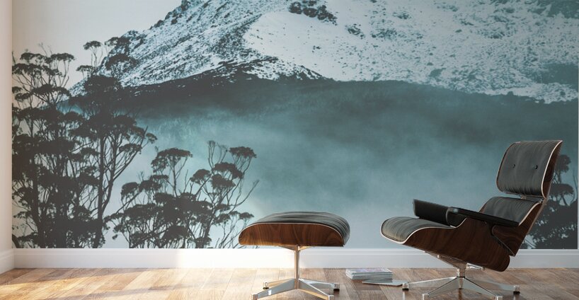 Dramatic dark blue mountain with snow and fog Wall Murals