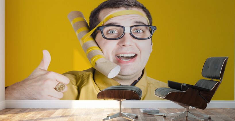 Inventive businessman with new technology Wall Murals