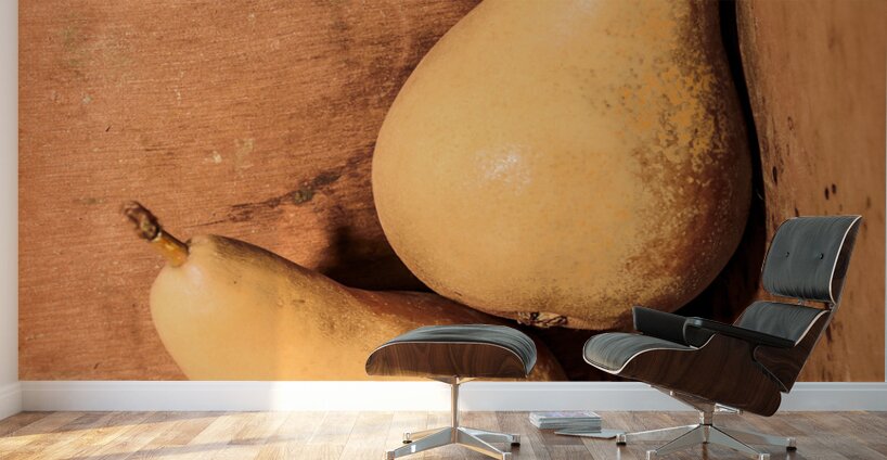 Yellow colored pears on wooden background Wall Murals