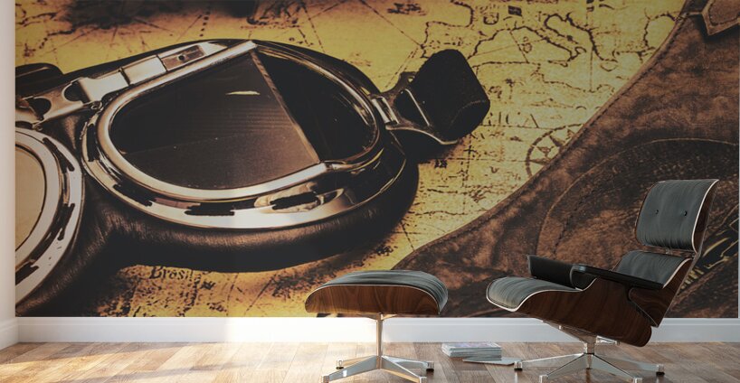 Aviator goggles cap and airplane on old world map Wall Murals