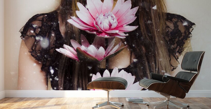 Beautiful young woman holding a delicate flower Wall Murals