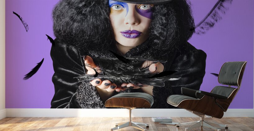 Magician blowing feathers Wall Murals