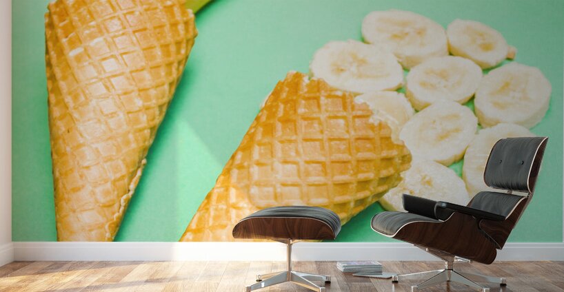 Whole bannana and slices placed in ice cream cone Wall Murals