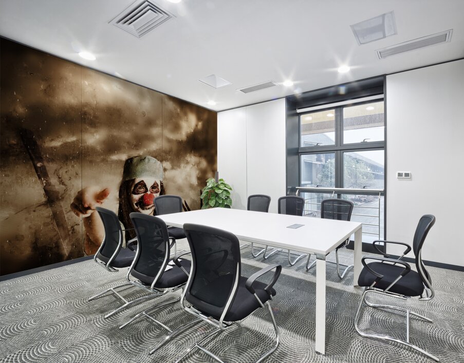 Scary clown doctor throwing knives outdoors Wall Printing