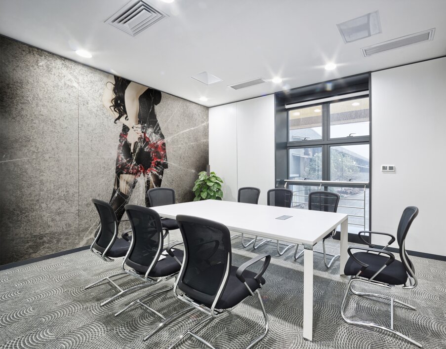 Sexy brunette woman holding gun with deadly style Wall Printing