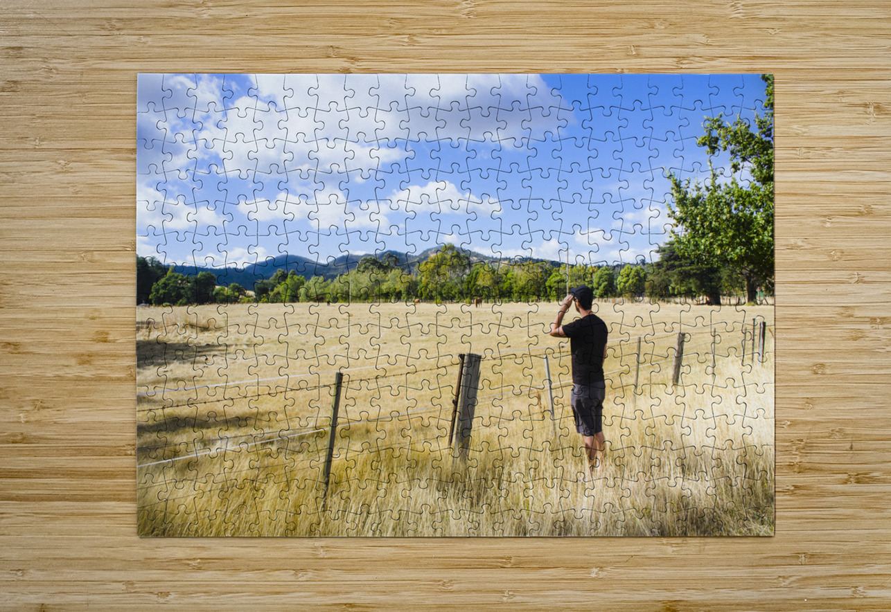 Man enjoying a rural farm landscape in Hobart Jorgo Puzzle printing