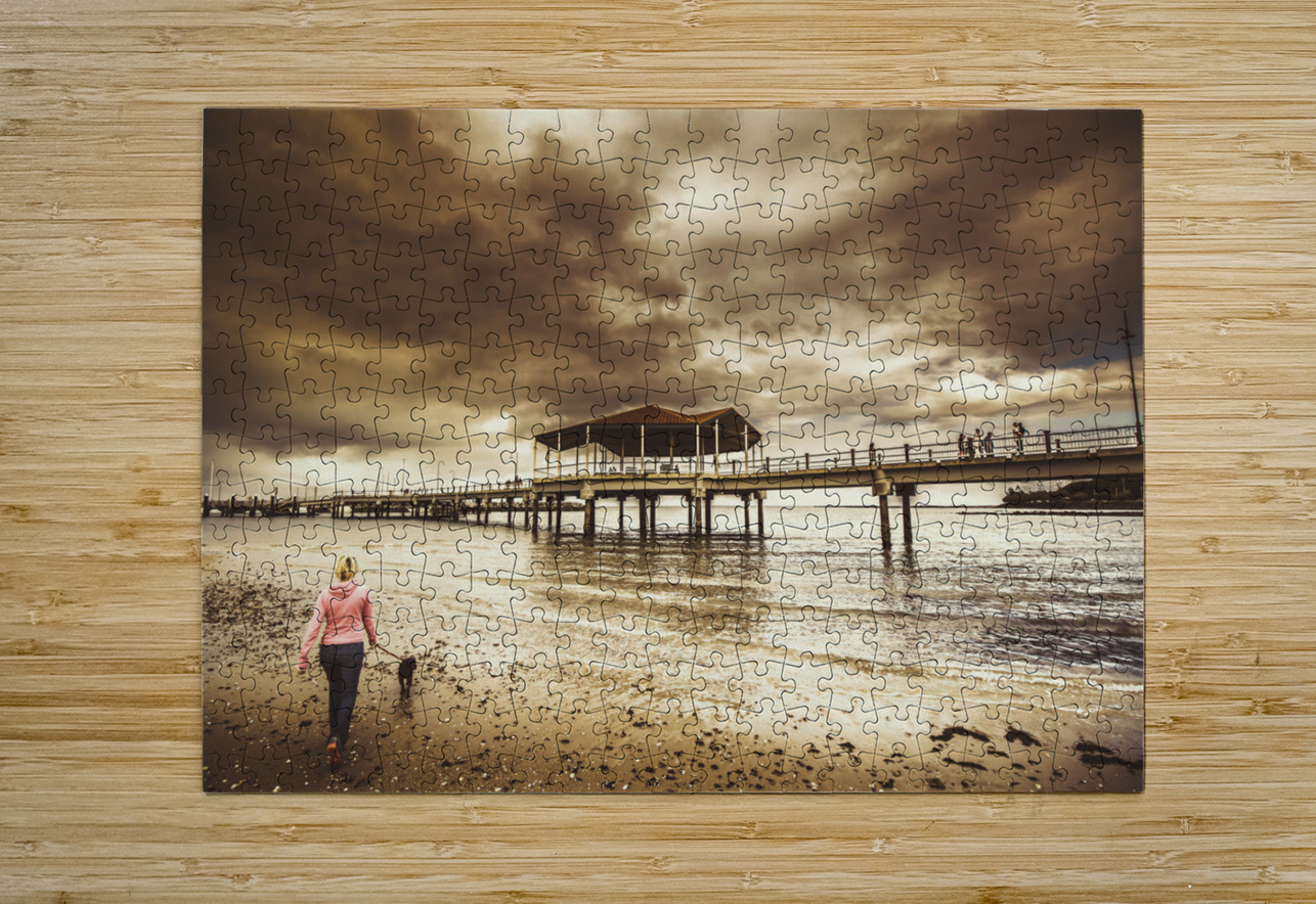 Woman walking dog on stormy beach Jorgo Puzzle printing