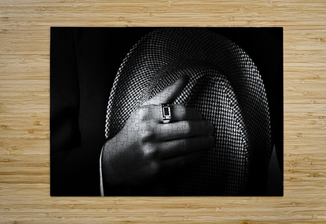 Close-up shot of a male ring hand holding hat Jorgo Puzzle printing