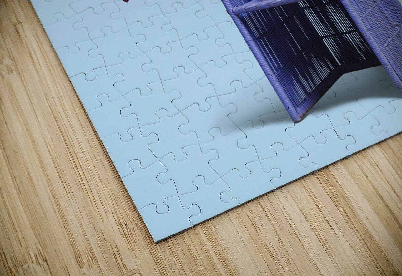 Woman sitting on a chair Jorgo Puzzle